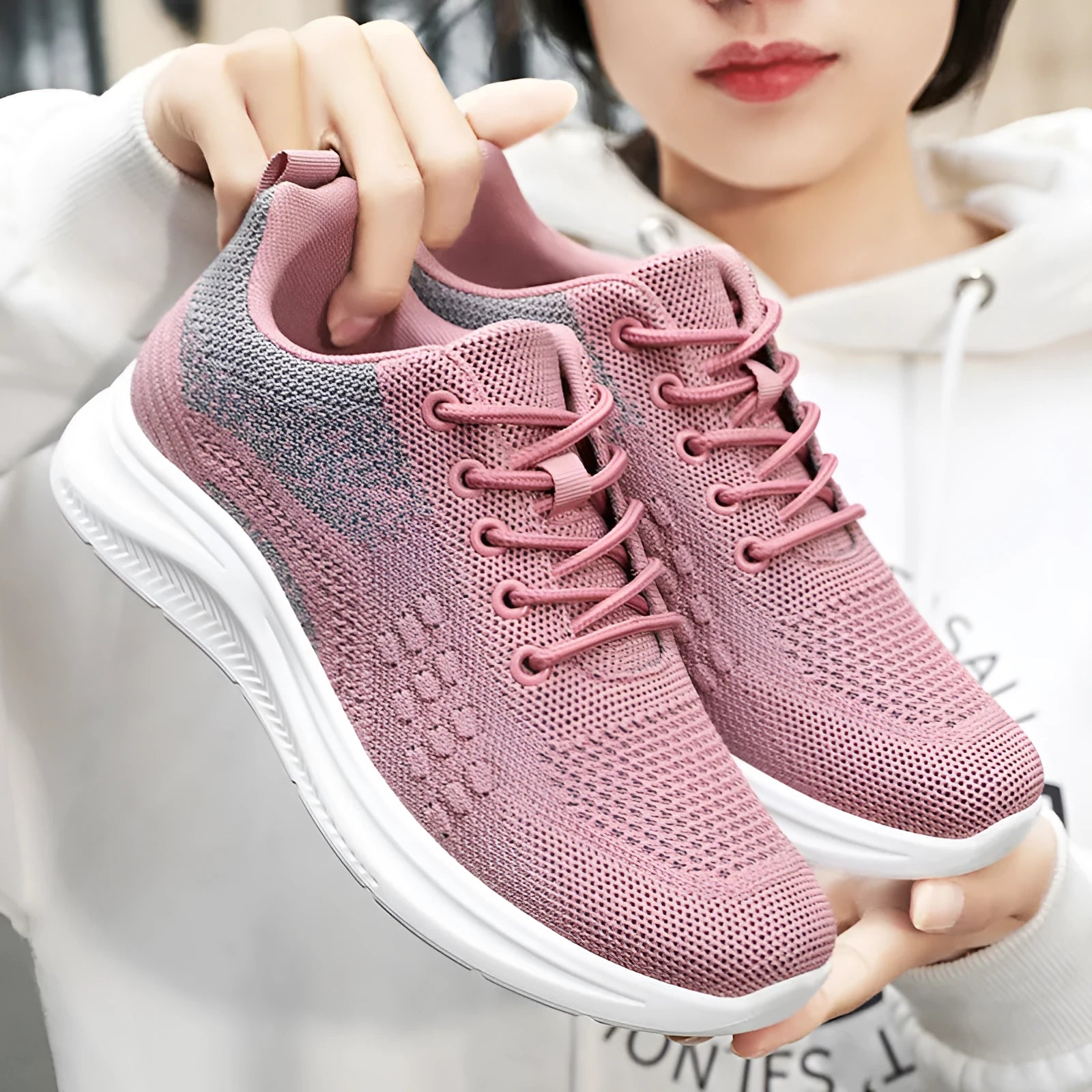 Women's black mesh casual sneakers with lace-up front and round toe