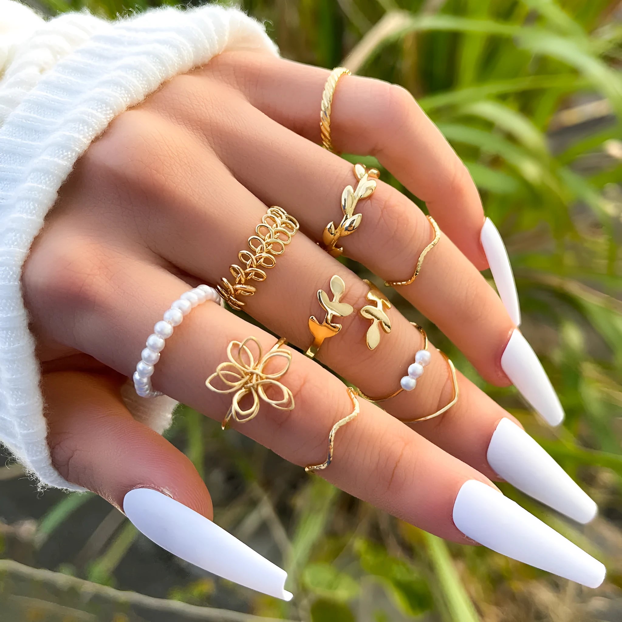 Openwork flower set ring with glossy gold finish showing floral pattern detail