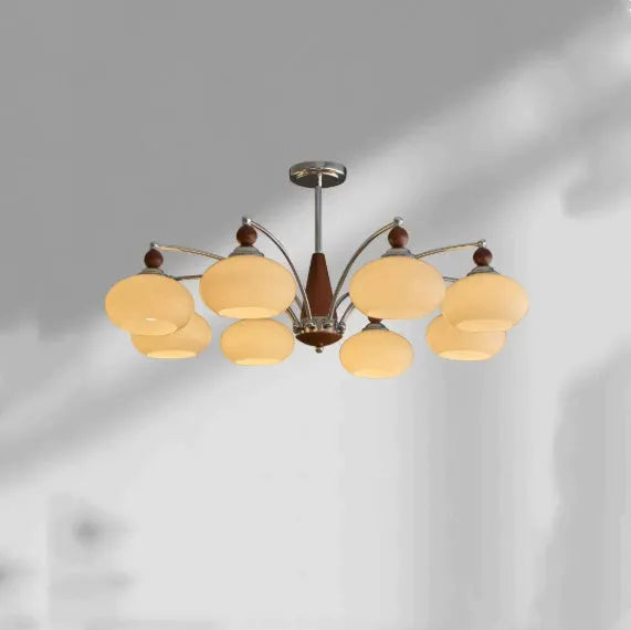 Creative persimmon glass chandelier with chrome frame and multiple glass shades in milky white or cream yellow.