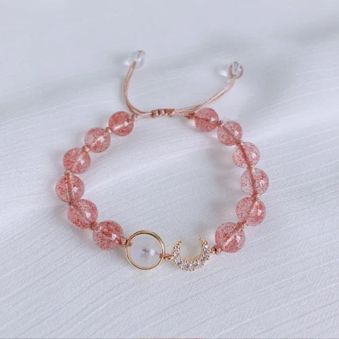 Handcrafted strawberry quartz crystal bracelet with Hetian jade peach blossom charms for women