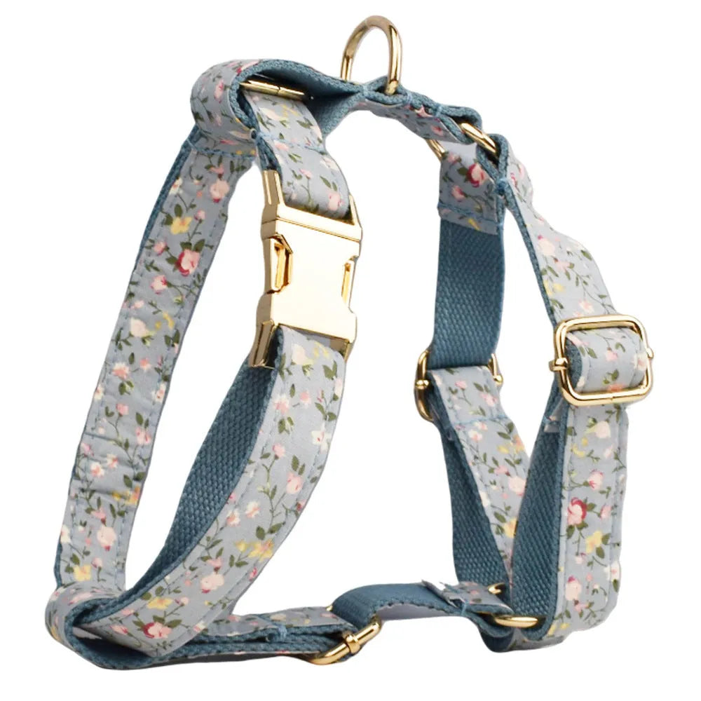 Floral pattern dog collar set with leash, vest, bow, and poop bag holder in five coordinated pieces