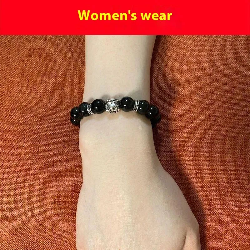 Obsidian bracelet with silver 999 detail and lucky colour eye beads in 10mm and 12mm sizes.
