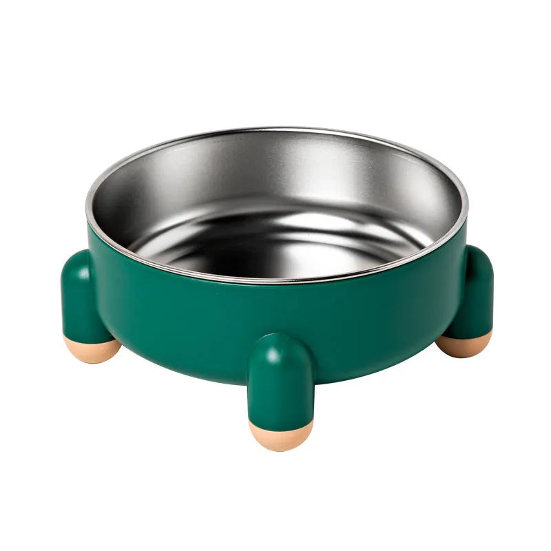 Green stainless steel pet bowl with a high foot and non-slip silicone base on a floor
