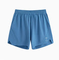 Black and blue four-point running shorts with laser punching stitching details on a mannequin.