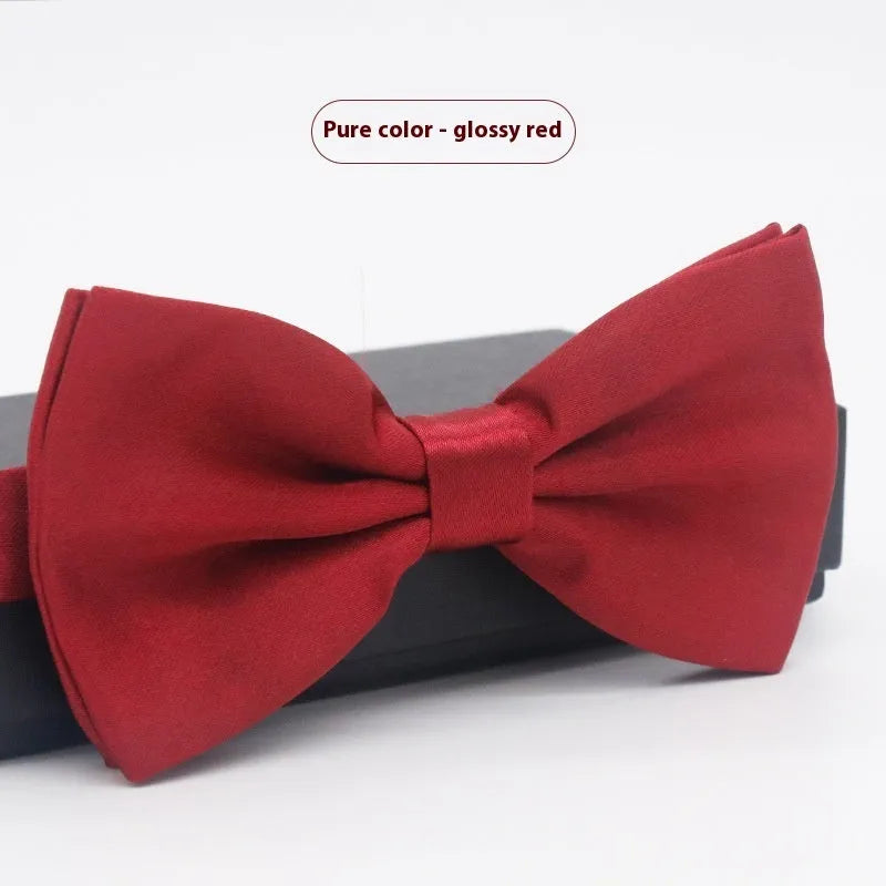 Solid colour polyester bow tie with flat head design measuring 12cm by 6cm