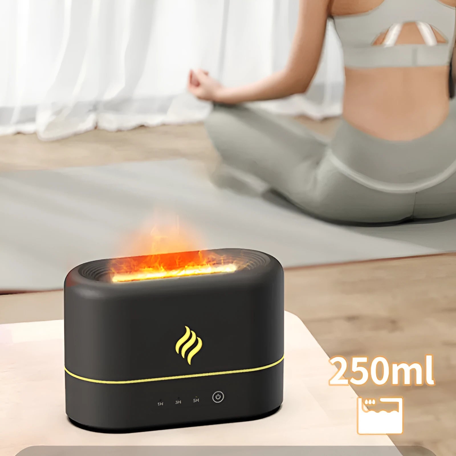 Black aromatherapy humidifier showing seven-colour flame lighting effect and emitting mist from a single outlet.