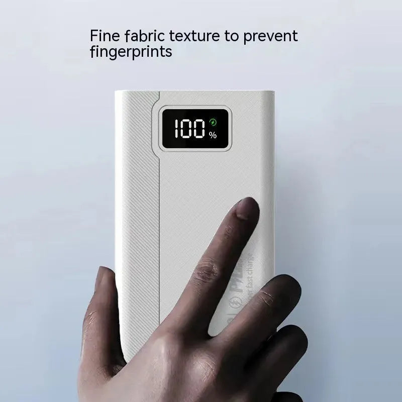 Large capacity power bank in black or white with plastic shell, showing fast charging capability and multiple capacity options