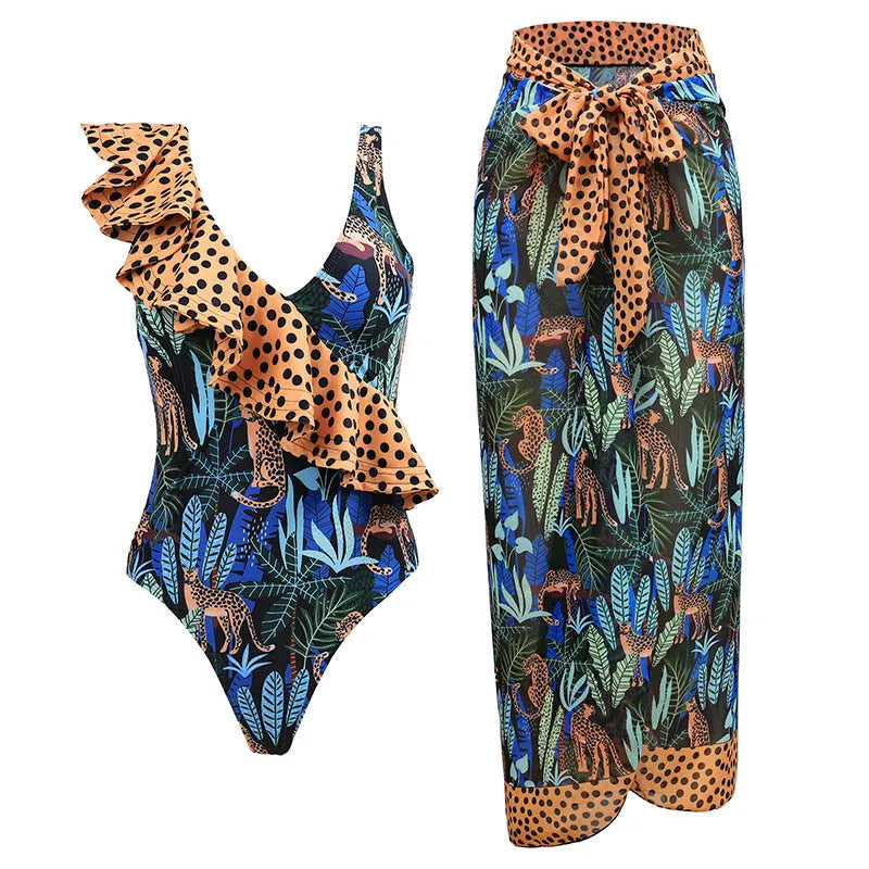 Solid colour women's one-piece swimsuit with spaghetti straps and a matching skirt.