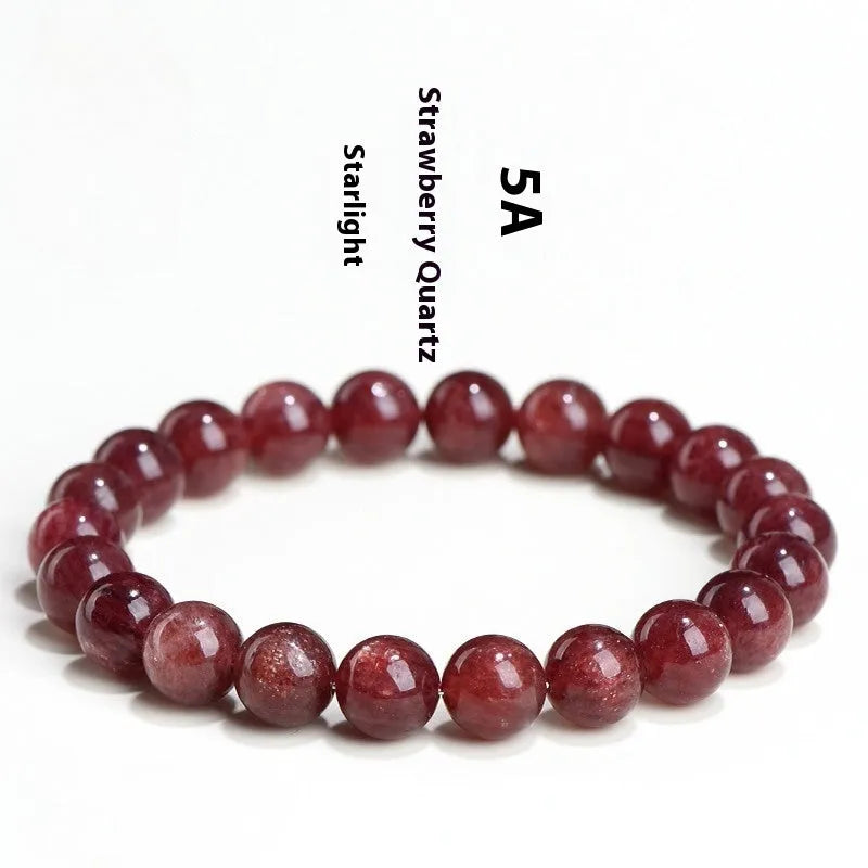 Natural red strawberry quartz crystal bracelet with geometric cut beads, shown in unisex styling.
