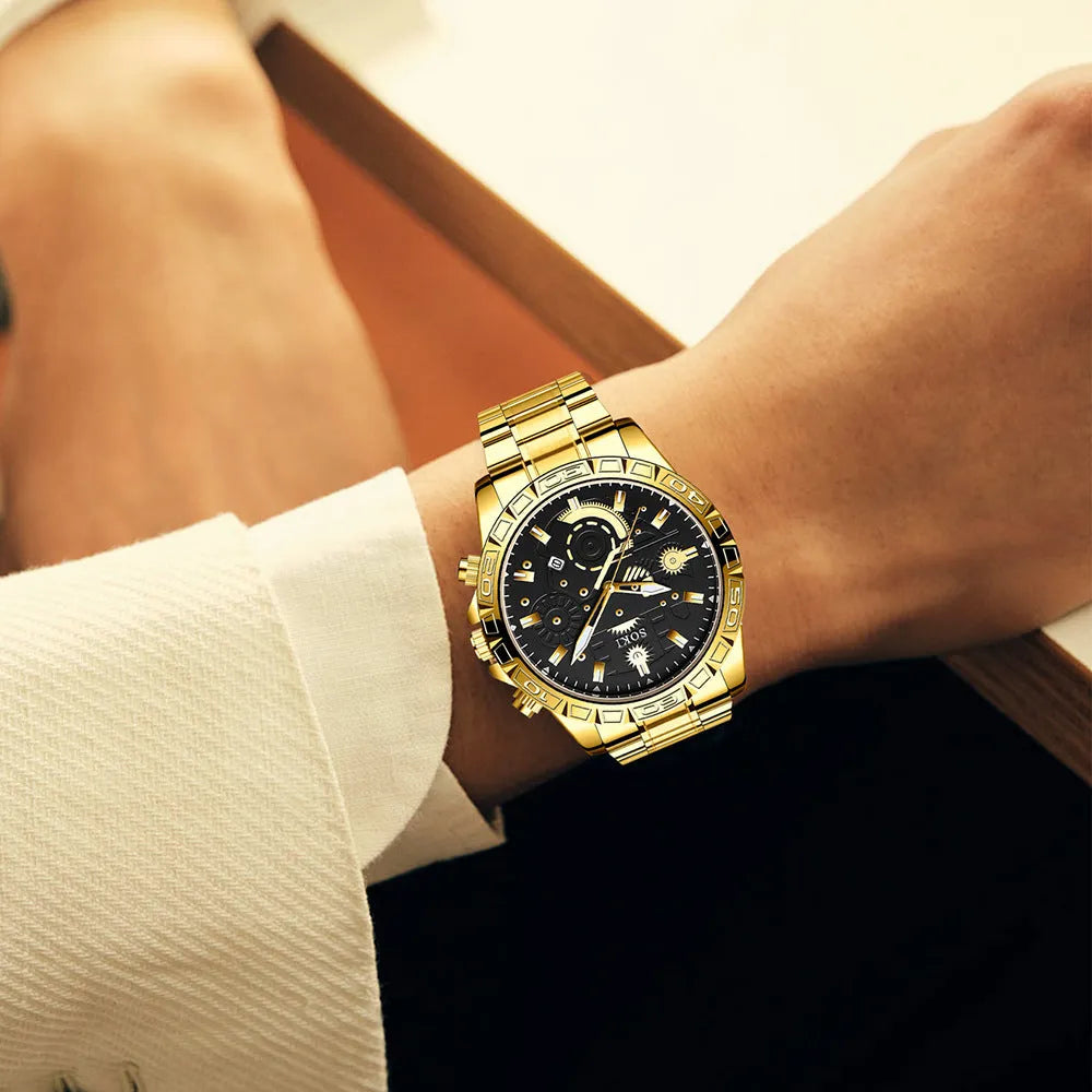 Gold men's stainless steel business quartz watch with calendar on wrist.