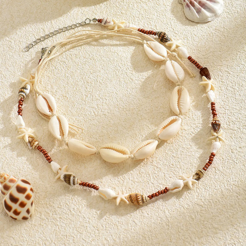 Natural shell geometric pendant necklace for women, handcrafted, bohemian style, colour X1900, on a regular chain.
