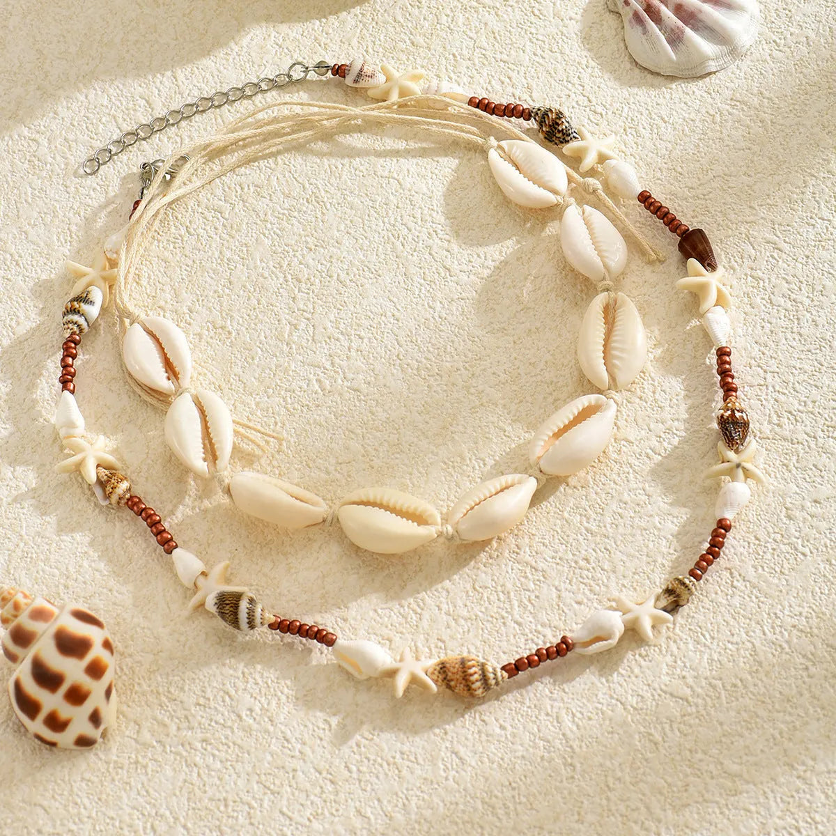 Natural shell geometric pendant necklace for women, handcrafted, bohemian style, colour X1900, on a regular chain.