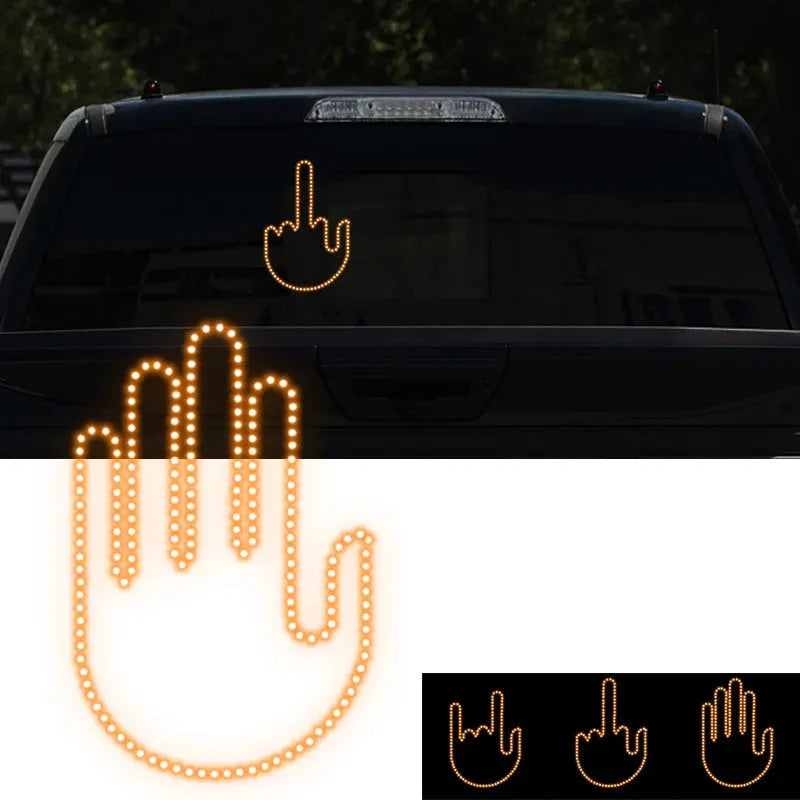 Black plastic car gesture light with LED illuminated hand gesture, remote control, and 3M Velcro mounting