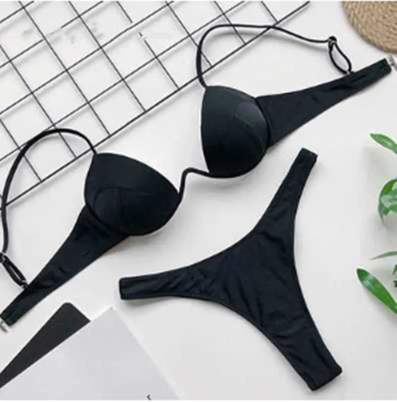 Gle Swimwear women's plain polyester swimsuit in black with simple bra style and mid-waist cut