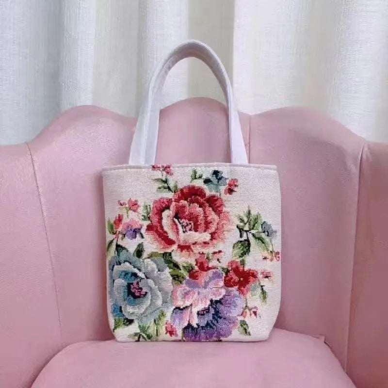 Double-sided gold wire embroidered canvas tote bag showing Bunny design with reinforced base