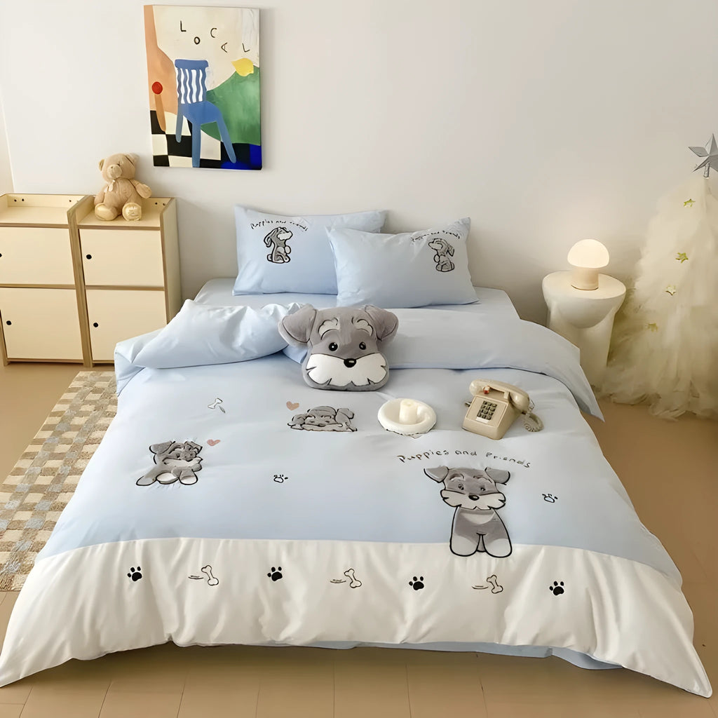 Cute Schnauzer dog cartoon pattern on a light blue thickened cotton quilt cover and matching pillowcases.