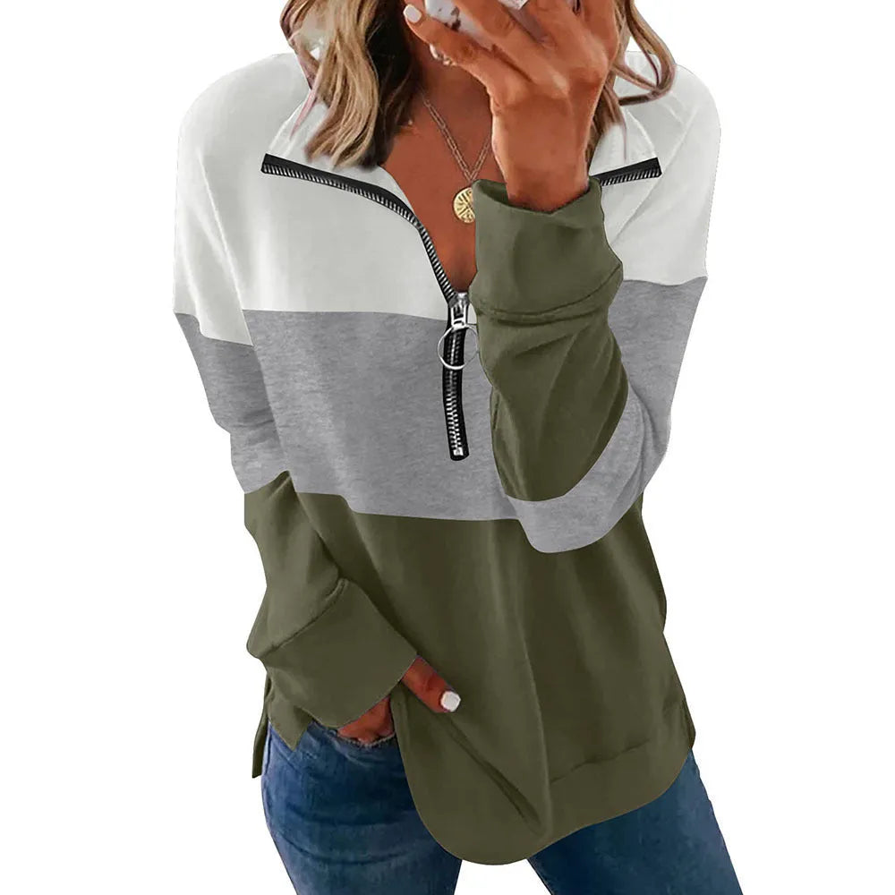 Women's loose long-sleeved leopard print sweater in various colours on a hanger.