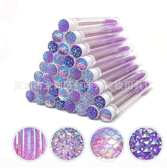 Disposable eyelash brushes in blue, green, pink and purple colours with transparent protective storage tubes