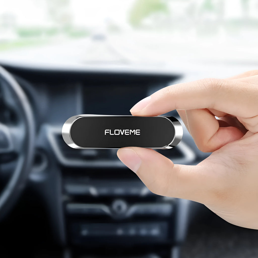 Black magnetic car phone holder with vent clip and silver iron plate for dashboard mounting