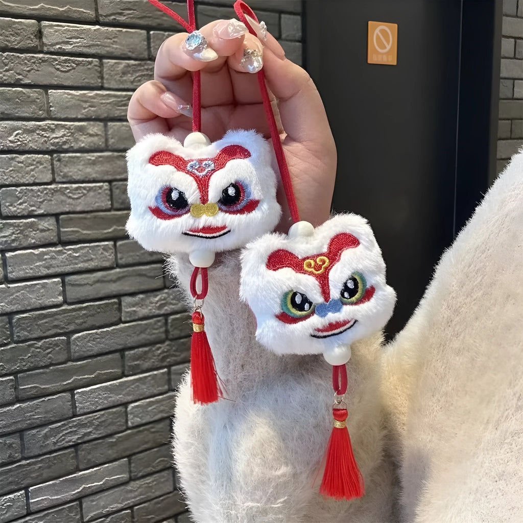 Blue and yellow handmade plush lion keychain with star stones and tassels in Chinese cartoon style