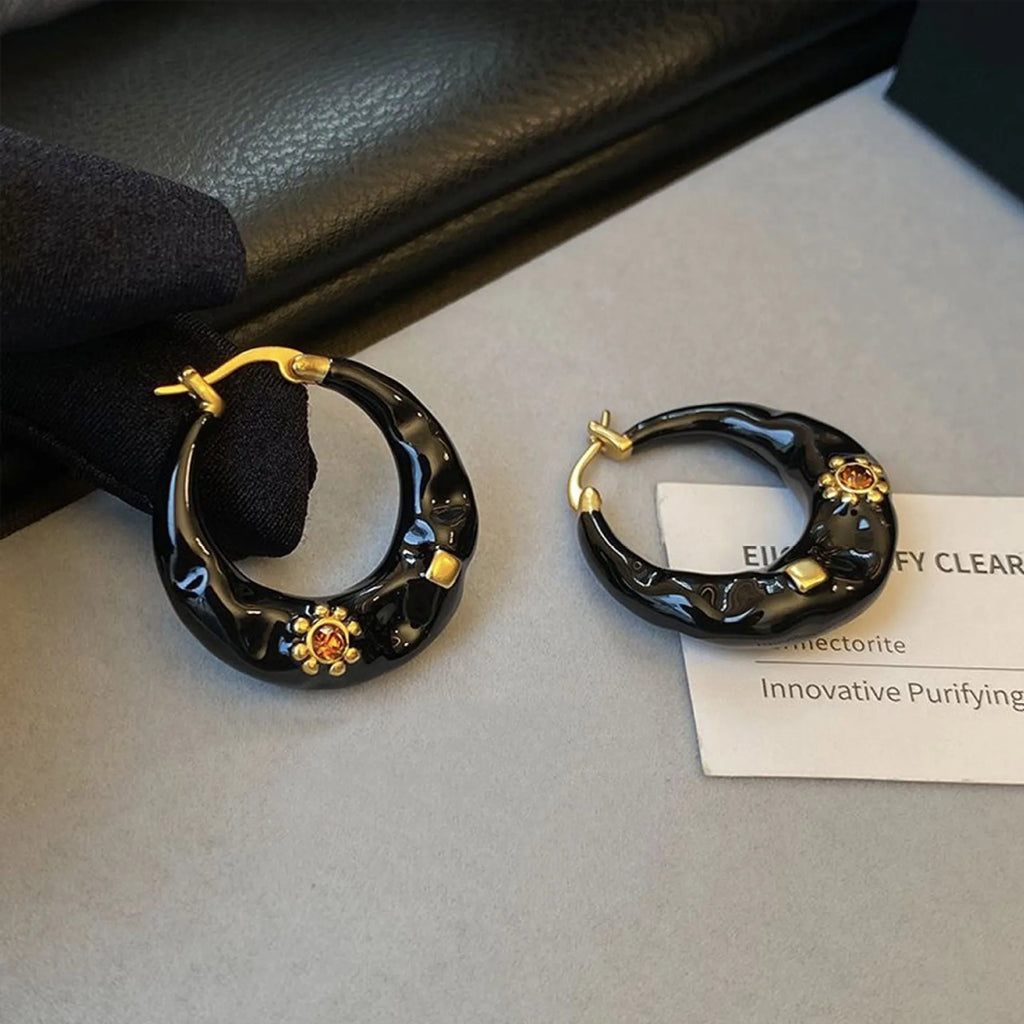 Hong Kong style retro ear studs with dripping oil finish and rhinestone inlay in black and red colours