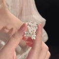 Three-dimensional jasmine flower ring with adjustable open mouth design in zinc alloy