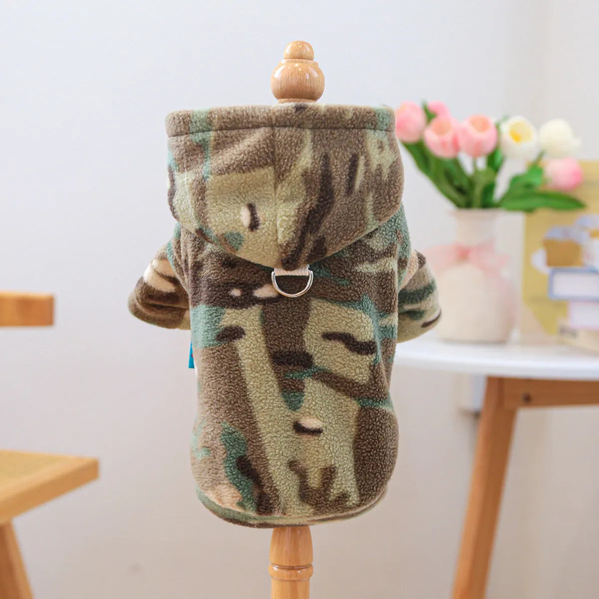 Camouflage dog sweater on a light background, showing full-body style with ribbed hem