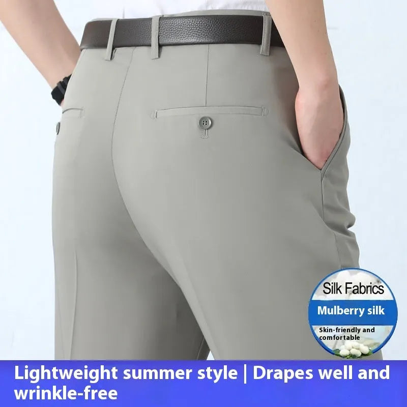 Men's straight leg formal trousers in a dark blue colour, showcasing the high waist and non-iron fabric blend.