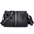 Black genuine leather crossbody bag with dimensions 24cm wide by 16cm high by 13cm deep
