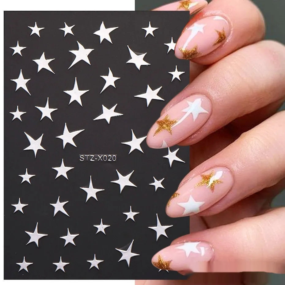 Sheet of black and silver strip nail art stickers with cartoon and love heart designs