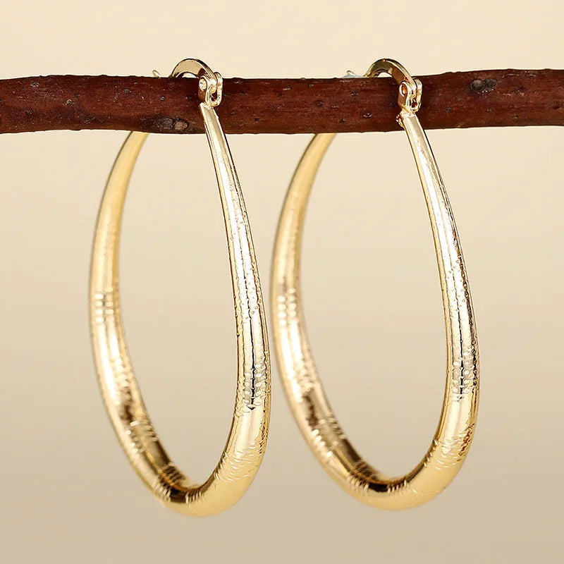 Women's copper geometric drop shape clip earrings with electroplating finish, European American style