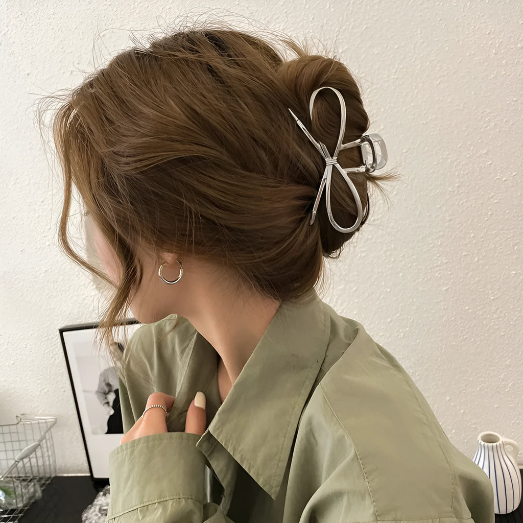 Women's bow barrette hair grip in gold or silver with Korean style design