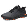 Men's black breathable mesh outdoor running shoe with lace-up front and rubber sole.