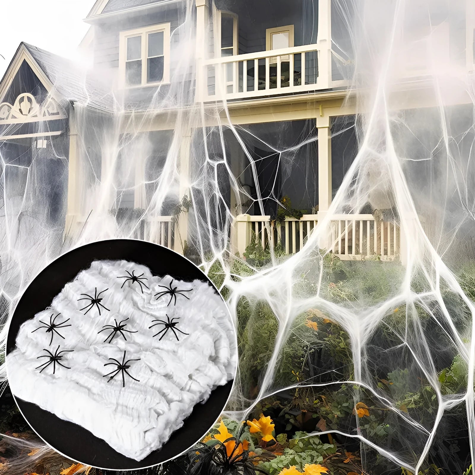 White cotton spider web Halloween decoration with plastic spiders draped over furniture