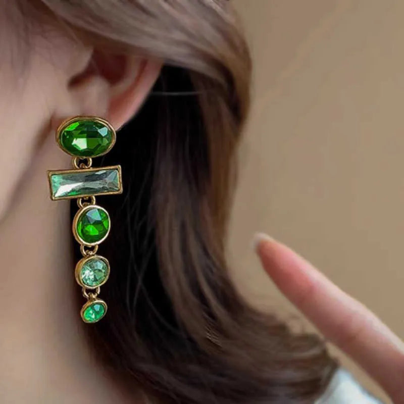 A pair of retro green gradient geometric earrings with tassels and inlaid zircon stones, Chinese-style design.