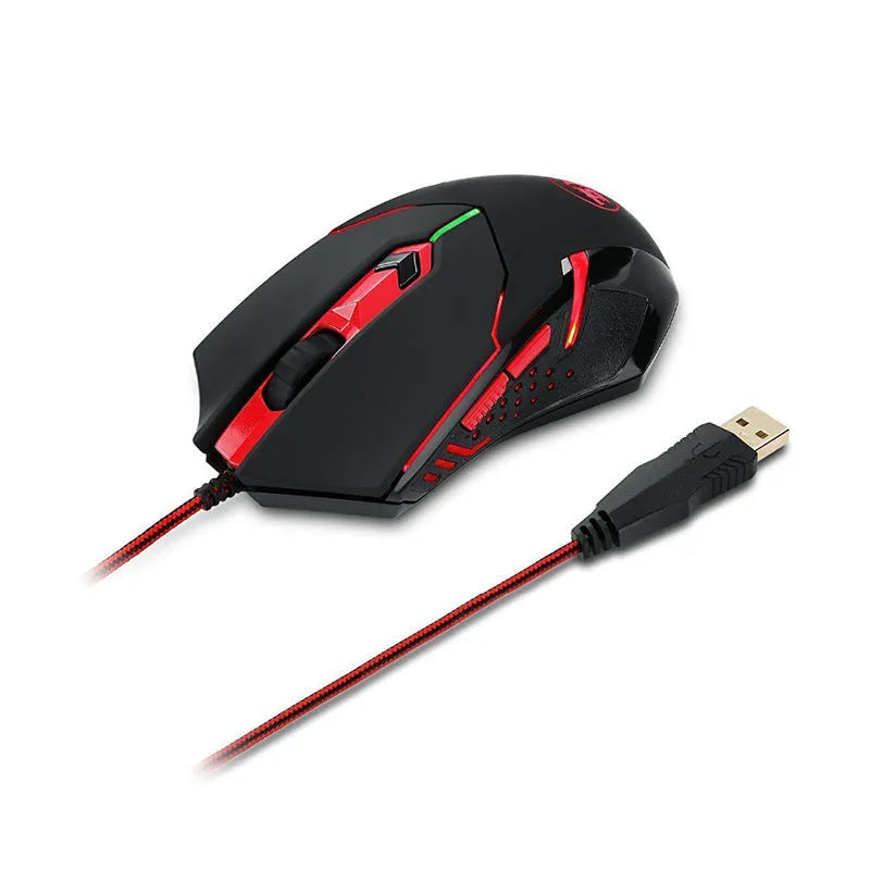 Black and red wired USB gaming mouse with six buttons on an office desk.