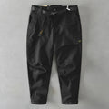 Men's khaki coloured cotton casual overalls with a loose fit and mid-waist design
