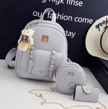 Three-piece women's bag set with floral backpack, shoulder bag and card holder