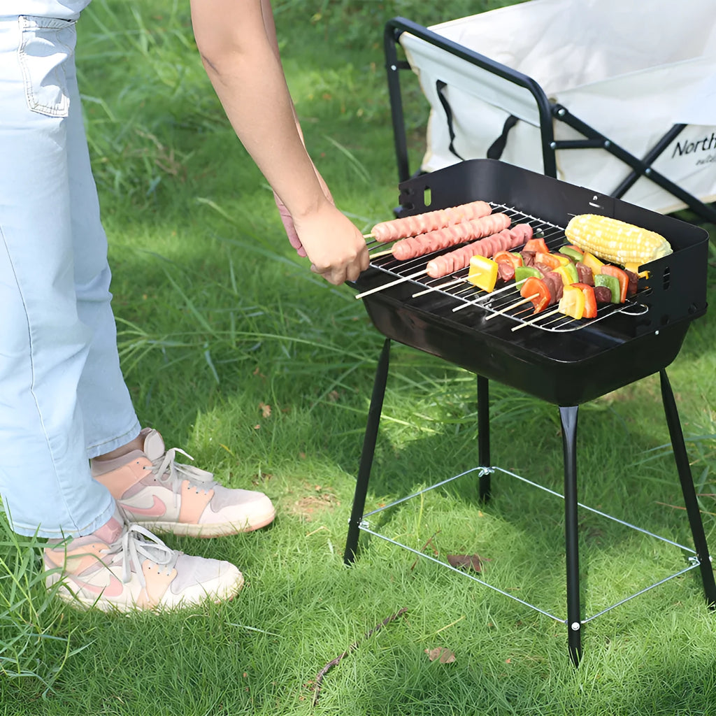 Portable metal barbecue oven in black, dimensions 29x12x44cm, suitable for camping and outdoor use