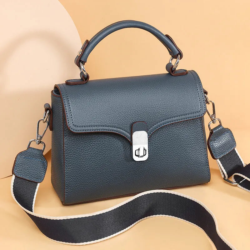 Korean commuter women's portable cross-body bag genuine leather oval shape in black with sandwich pocket