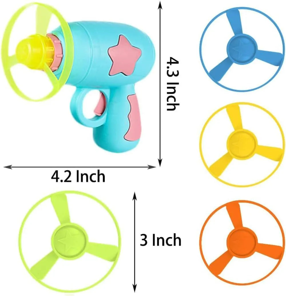 Blue plastic cat toy gun launcher with a mounted orange Frisbee, shown next to a second green Frisbee.
