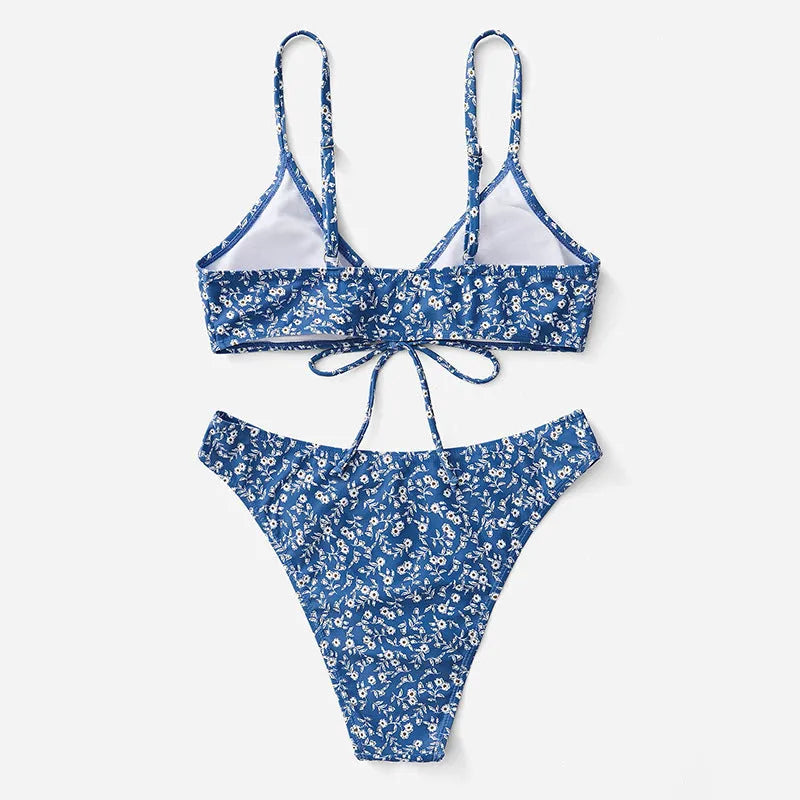 Blue polyester three-piece women's swimsuit set with top and shorts