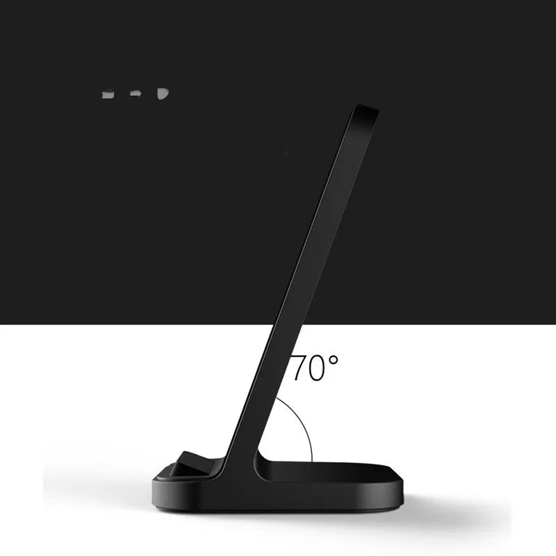 Dark grey vertical wireless charging stand for Apple iPhones on desktop