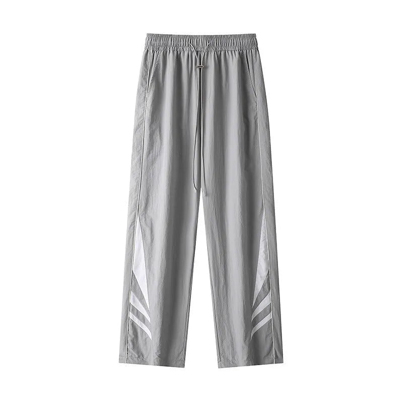 Men's straight-leg casual trousers in black or grey, featuring an elastic waist and thin summer fabric.