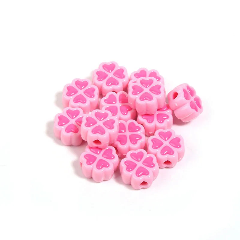 Assortment of 15mm frosted acrylic four-leaf clover beads in rose red, pink, yellow, green, blue, and purple colours.
