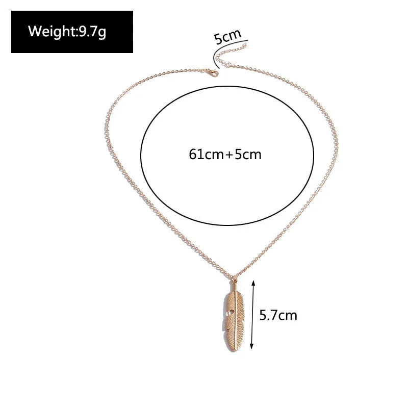 Retro feather tassel necklace for women in gold with geometric leaf pendant and feather tassel on alloy chain