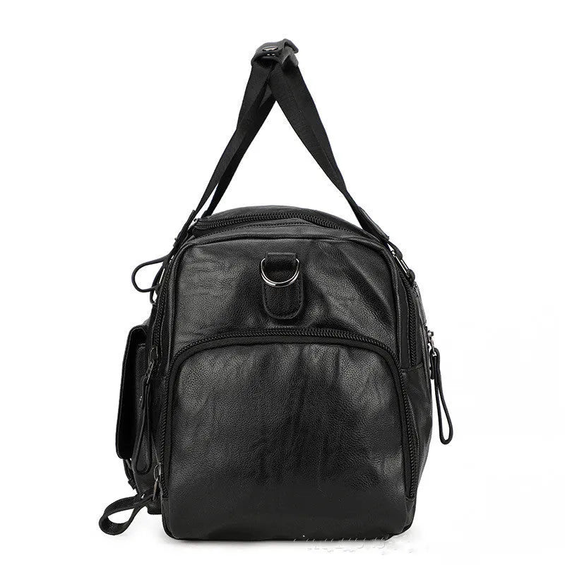Large black travel bag with dual shoulder straps and a separate internal shoe compartment.