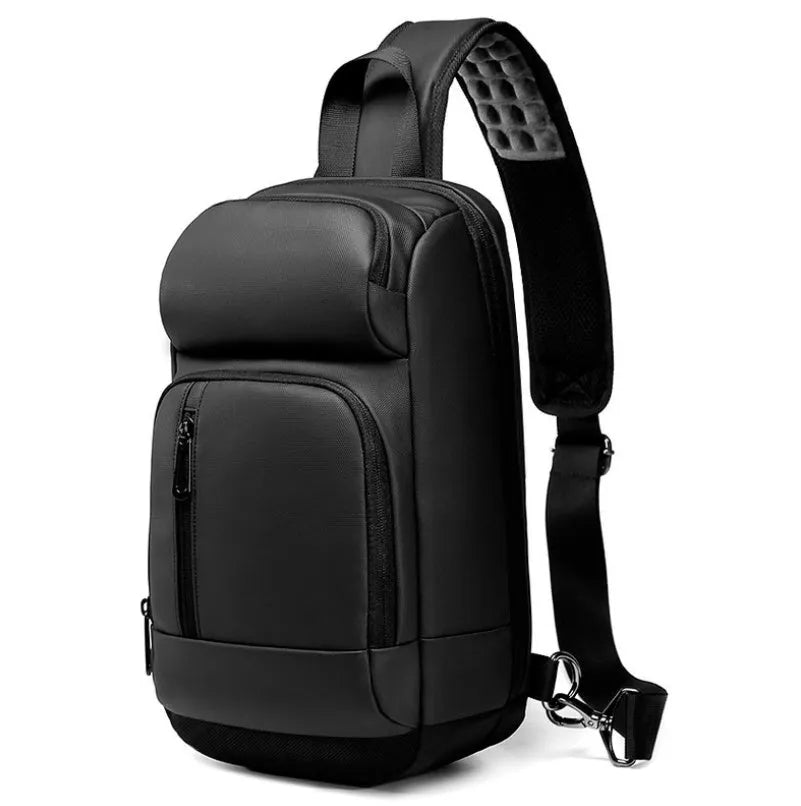 Black PVC outdoor shoulder bag showing medium size, shoulder strap, and internal pocket organisation