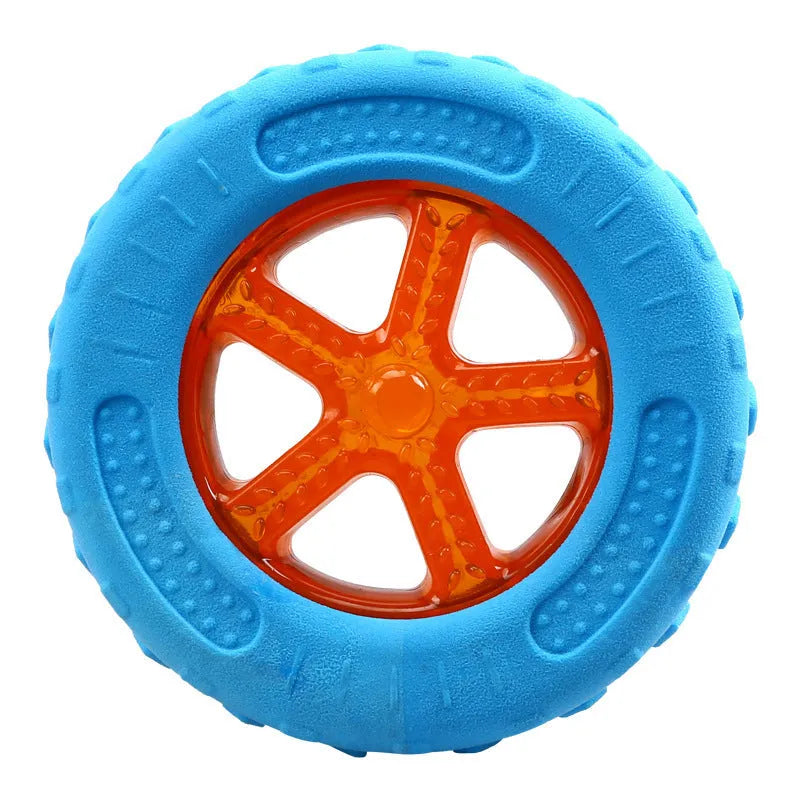 Set of three TPR dog toys: a red ball, blue barbell, and orange tyre on a blue background.