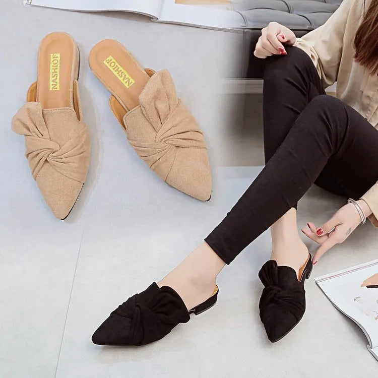 Suede pointed slippers with bow decoration, low square heel, black and beige colour options
